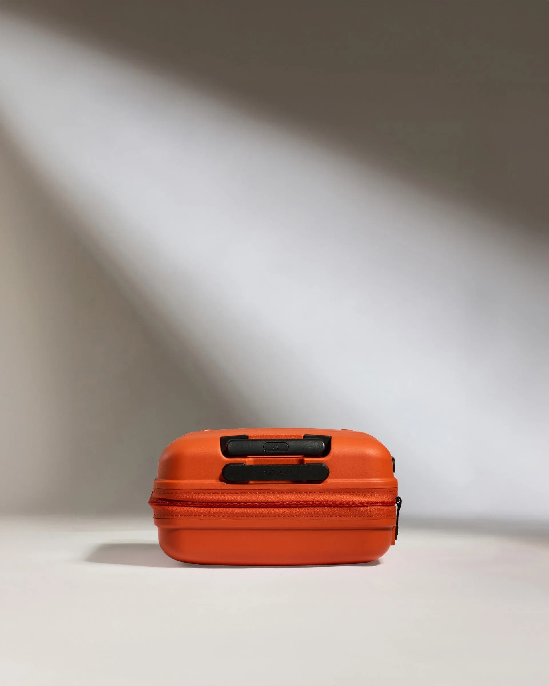 Cabin Suitcase in Ember Orange - Single Stripe