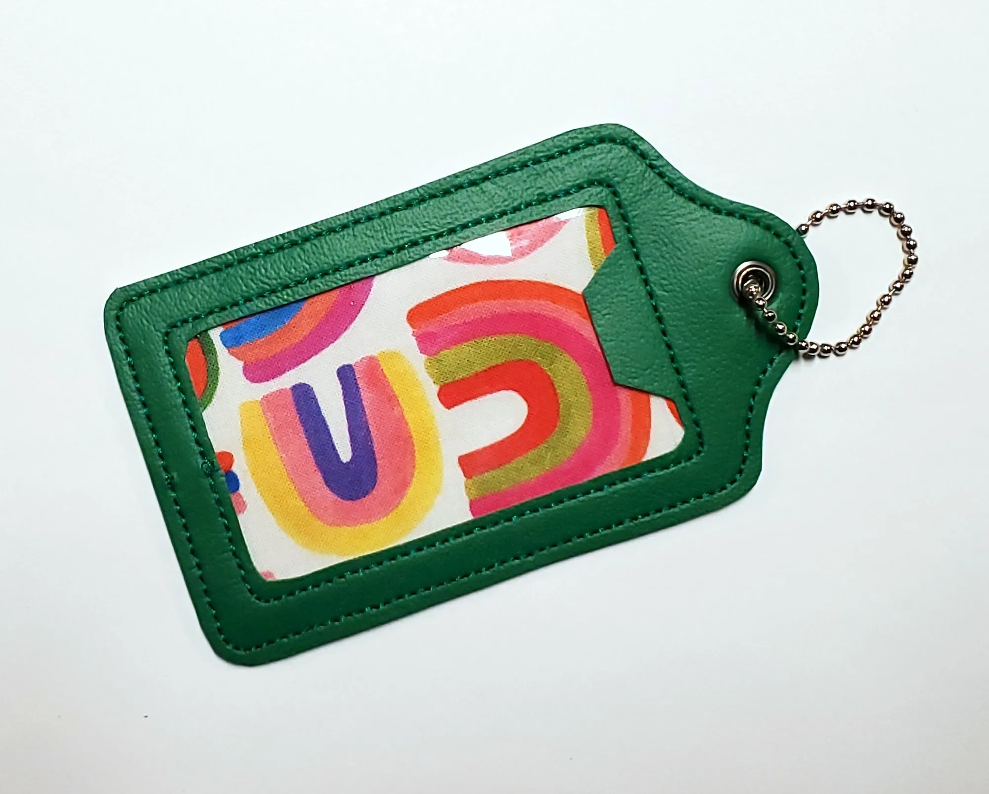 Green Medical Equipment Luggage Tag with Rainbow print