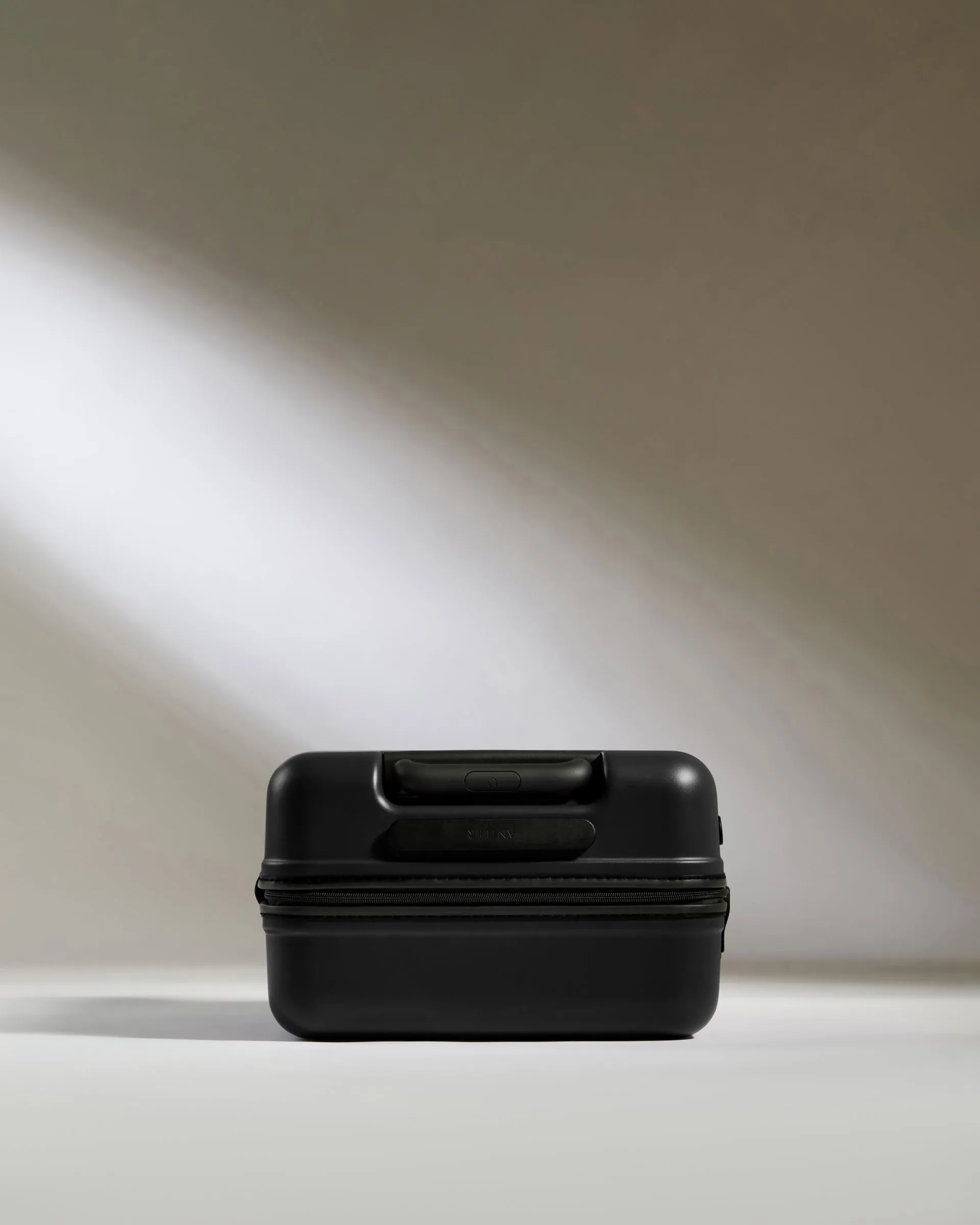 Large Cabin Suitcase in Black - Icon Stripe